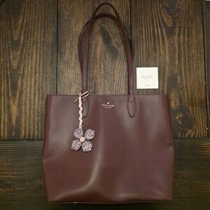 Kate Spade Deep Burgundy Tote with Floral Charm